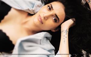 Karishma Tanna flaunts her tattoo for a click